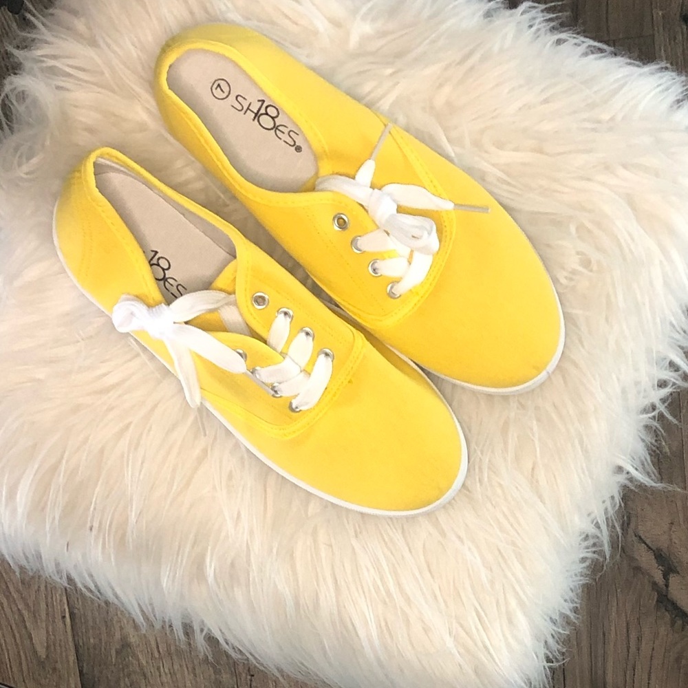 Yellow canvas shoes